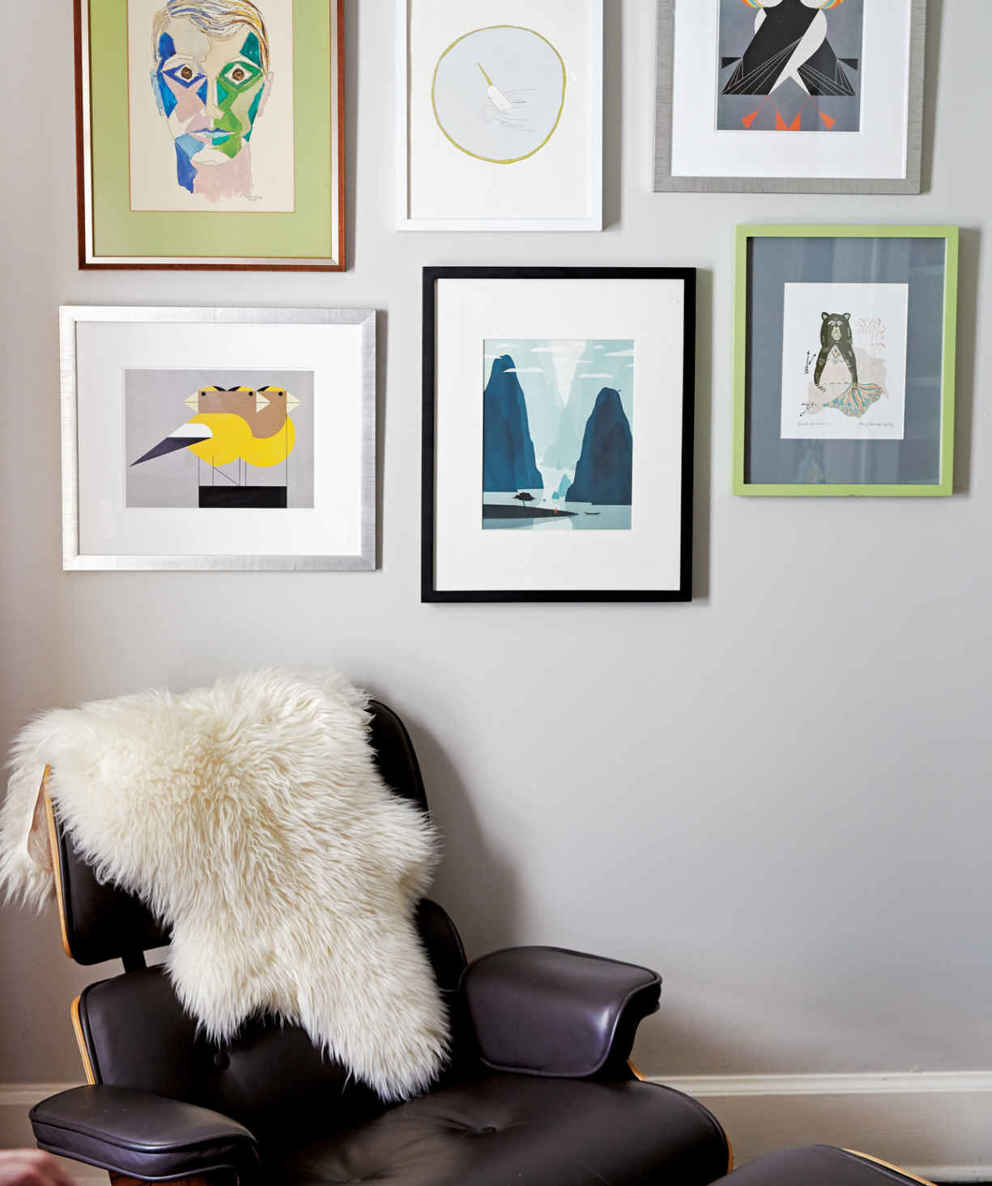GROUP SHOW. Gallery walls visually work as one large piece of art but can be tricky to hang (see chapter 9 for advice). Start by arranging each piece on the floor until you’re happy with the overall grouping, then hang it on the wall.