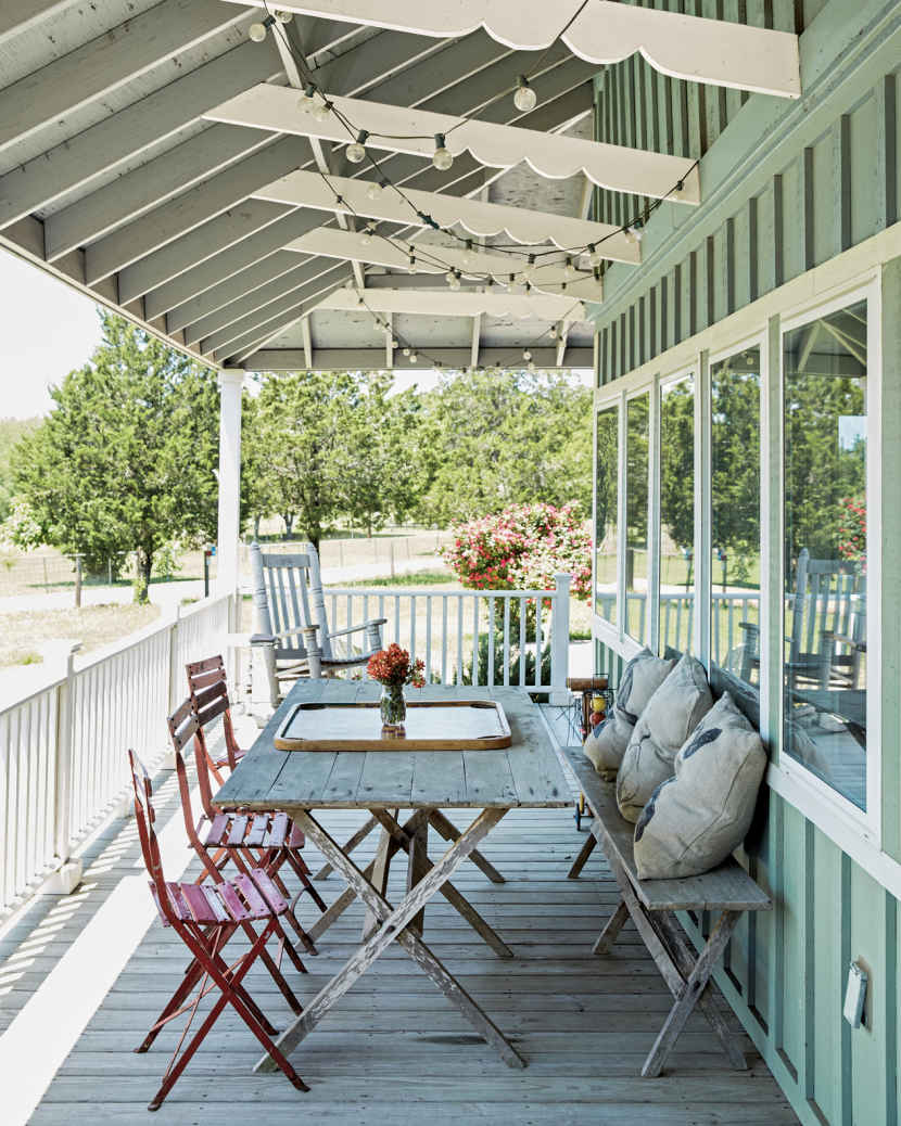 INTO THE FOLD. Every piece of outdoor furniture on this porch collapses and folds, making it easier to stow in the winter months.