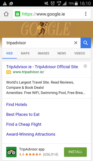 A screenshot image depicting Google AdWords app download extension for TripAdvisor