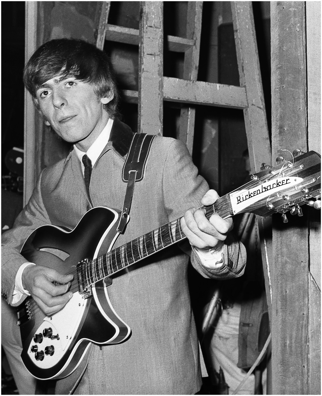 UNITED KINGDOM - MARCH 01:  Photo of George HARRISON and BEATLES; George Harrison (with Rickenbacker 360/12 guitar), posed on the set of 'A Hard Day's Night' at the Scala Theatre  (Photo by K & K Ulf Kruger OHG/Redferns)