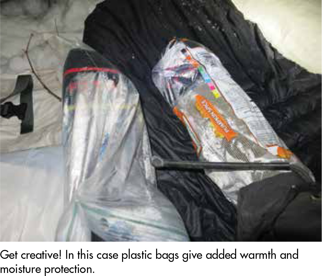 Get creative! In this case plastic bags give added warmth and moisture protection.